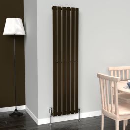 A 1600mm x 410mm Flat Vertical Single Radiator in an Antique Brass finish with a chrome thermostatic valve in a living room setting.