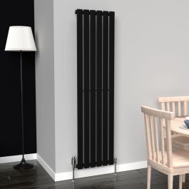 A 1600mm x 410mm Flat Vertical Single Radiator in a Space Black finish with a chrome thermostatic valve in a living room setting.