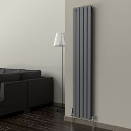 A 1800mm x 350mm Flat Double Vertical Radiator in an Anthracite finish with a chrome thermostatic valve in a living room setting.