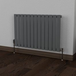 A 600mm x 910mm Flat Single Horizontal Radiator in an Anthracite finish with a chrome thermostatic valve in a living room setting.
