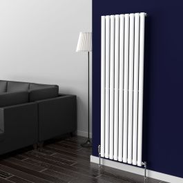A 1600mm x 540mm Vertical Oval Single Radiator in a White finish with chrome valves within a living room setting